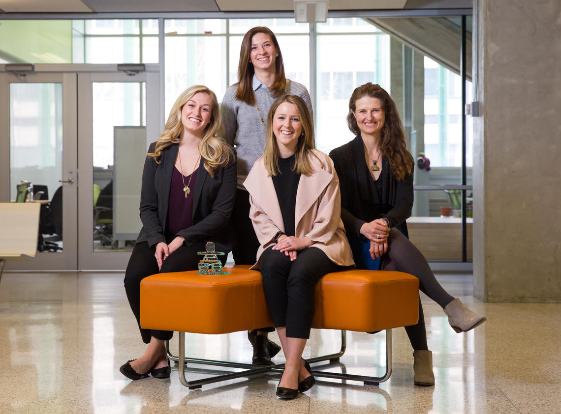 Megan Wibberley, back row, Tori Grant, Áine Keogh and Rachelle Haddock, front row from left, are each other’s greatest cheerleaders — Keogh received a 2017 U Make a Difference award thanks to her three direct reports who nominated her.