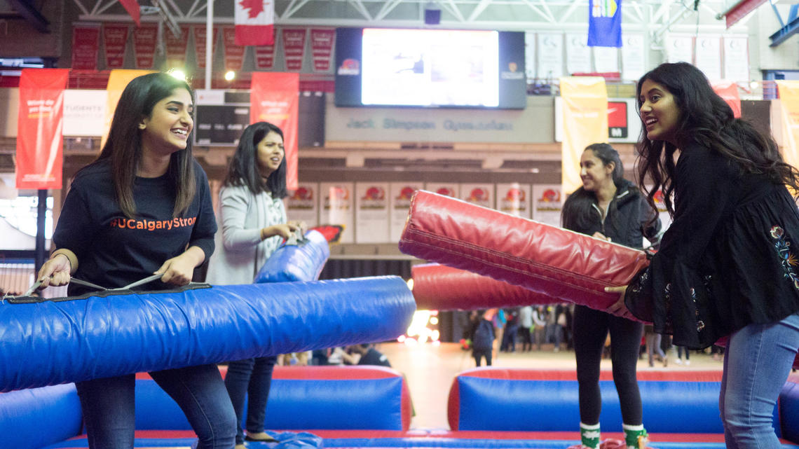 Volunteering is fun! Raveena Sangha takes a break from volunteering to enjoy the festival activities.