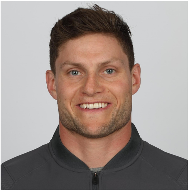 Keenan MacDougall's official CFL coaching mug shot, taken for the 2019 season.