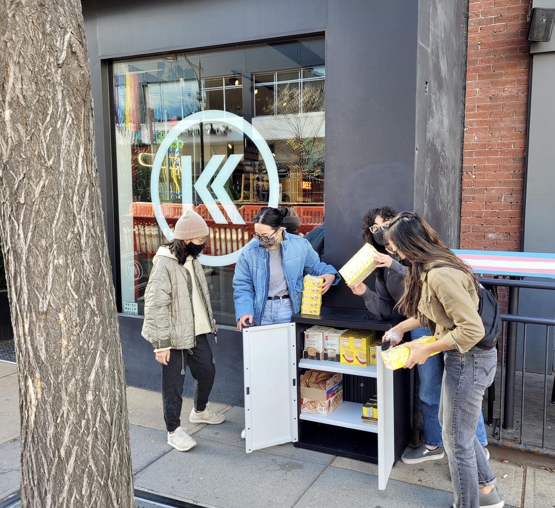 The Hatch members at the community pantry outside of Kaffeklatsch on 12 Avenue and 1 Street SW. 