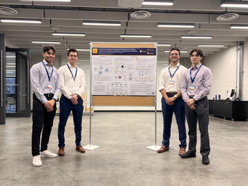 The team showcasing their work at the University of Ottawa.