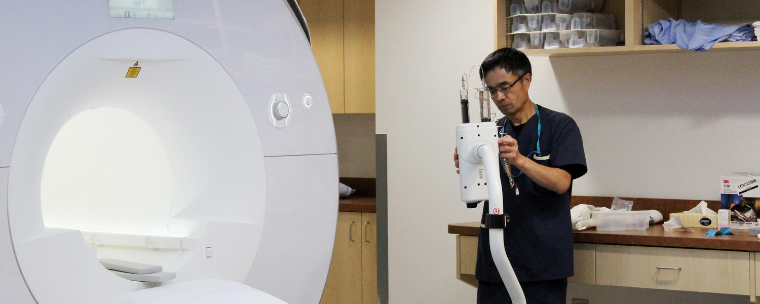 Cardiac MRI machine with technician