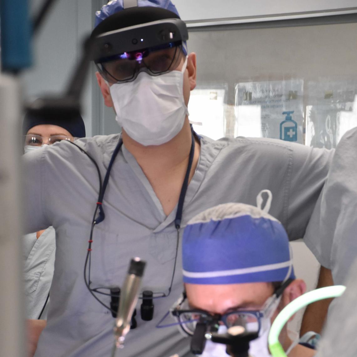 Dr. William Kent performed the mitral valve surgery, while Dr. Corey Adams used the Hololens to transmit images.