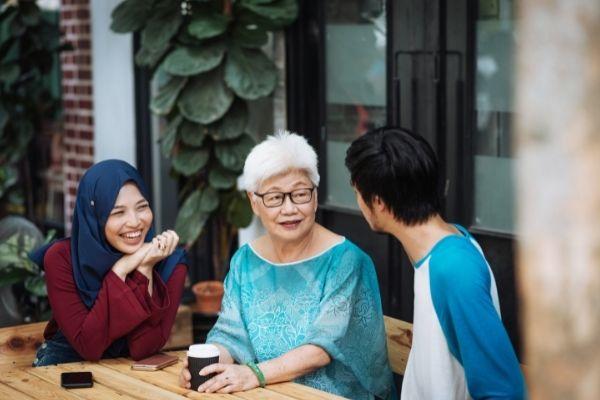 family sitting around a table talking