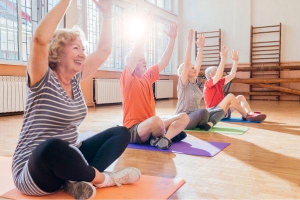 seniors doing yoga