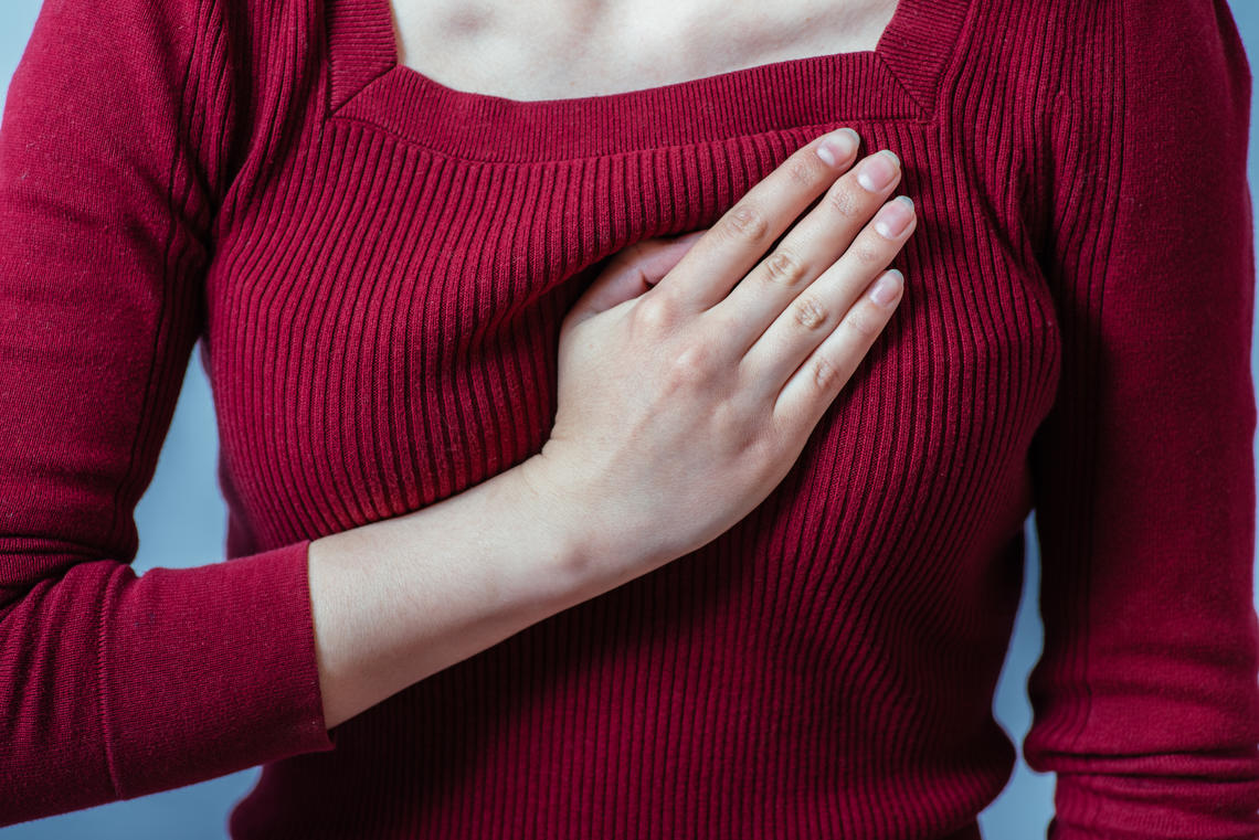 Woman having a heart attack