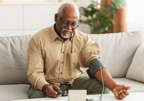 man checking his blood pressure