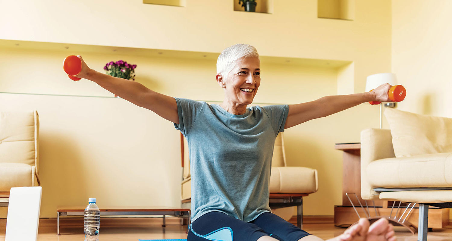 senior woman lifting weights