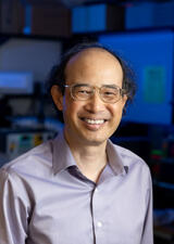 Wayne Chen poses in his lab at the University of Calgary