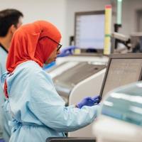 woman working with a machine