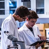 two students in a lab